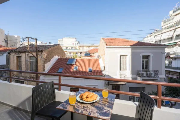 Breakfast on the balcony with Chania rooftop views, Amara Local Experience