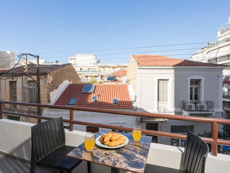 Breakfast on a balcony above the rooftops of Chania