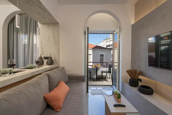 Living area with arched opening to the balcony, Amara Local Experience, Nea Chora Chania
