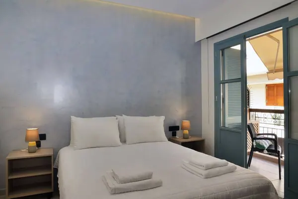 Double bed with balcony doors open, Amara Porto Living Apartment 1, Chania