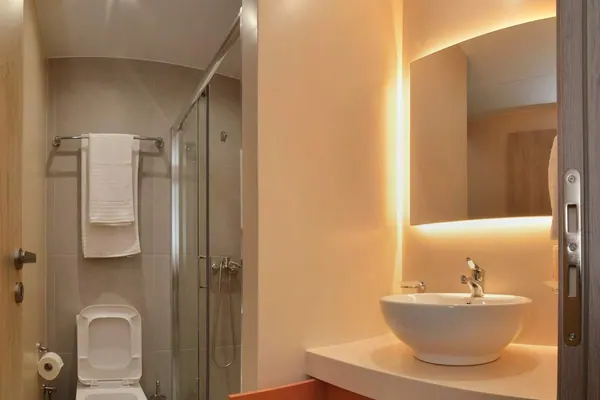 Bathroom with shower cabin and basin, Amara Porto Living Apartment 2, Chania