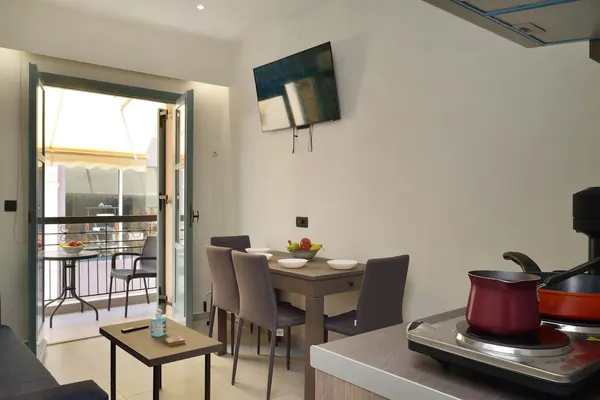 Living and dining area facing the balcony, Amara Porto Living Apartment 2, Chania Old Town