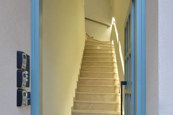 Entrance door and staircase to the first floor, Amara Porto Living, Chania