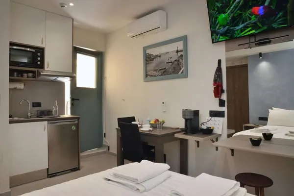 Open-plan studio with kitchenette and double bed, Amara Porto Living Studio, Chania Old Town
