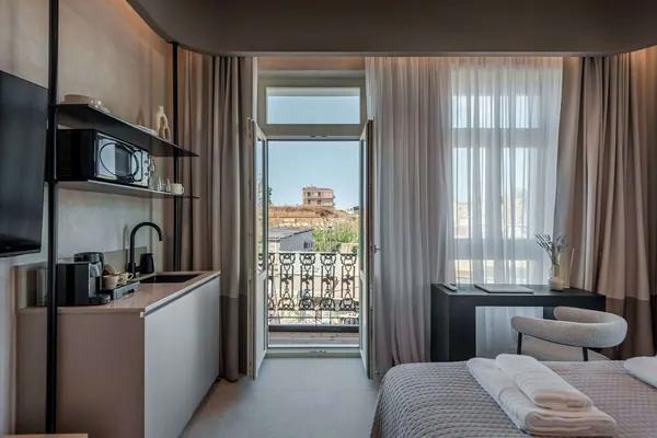 Balcony doors with Chania city view, kitchenette and hot tub, Amara Luxury Suite with City Balcony