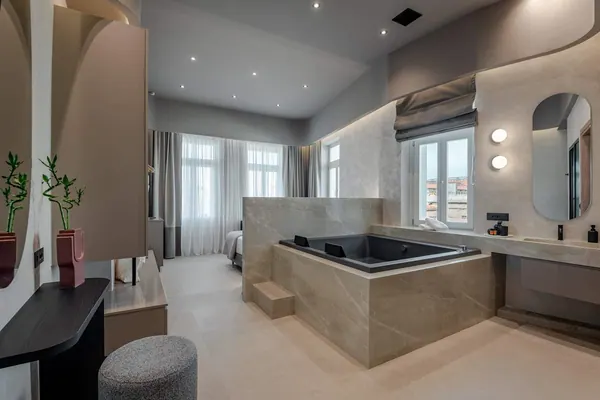 Open-plan suite with private hot tub, Amara Luxury Suite with Hot Tub & City Balcony