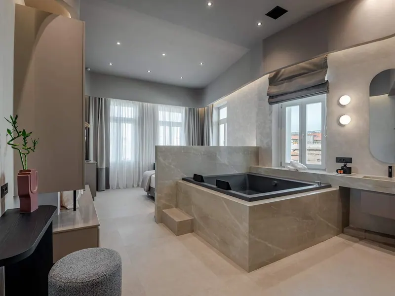 Open-plan suite with private hot tub, Amara Luxury Suite with Hot Tub & City Balcony