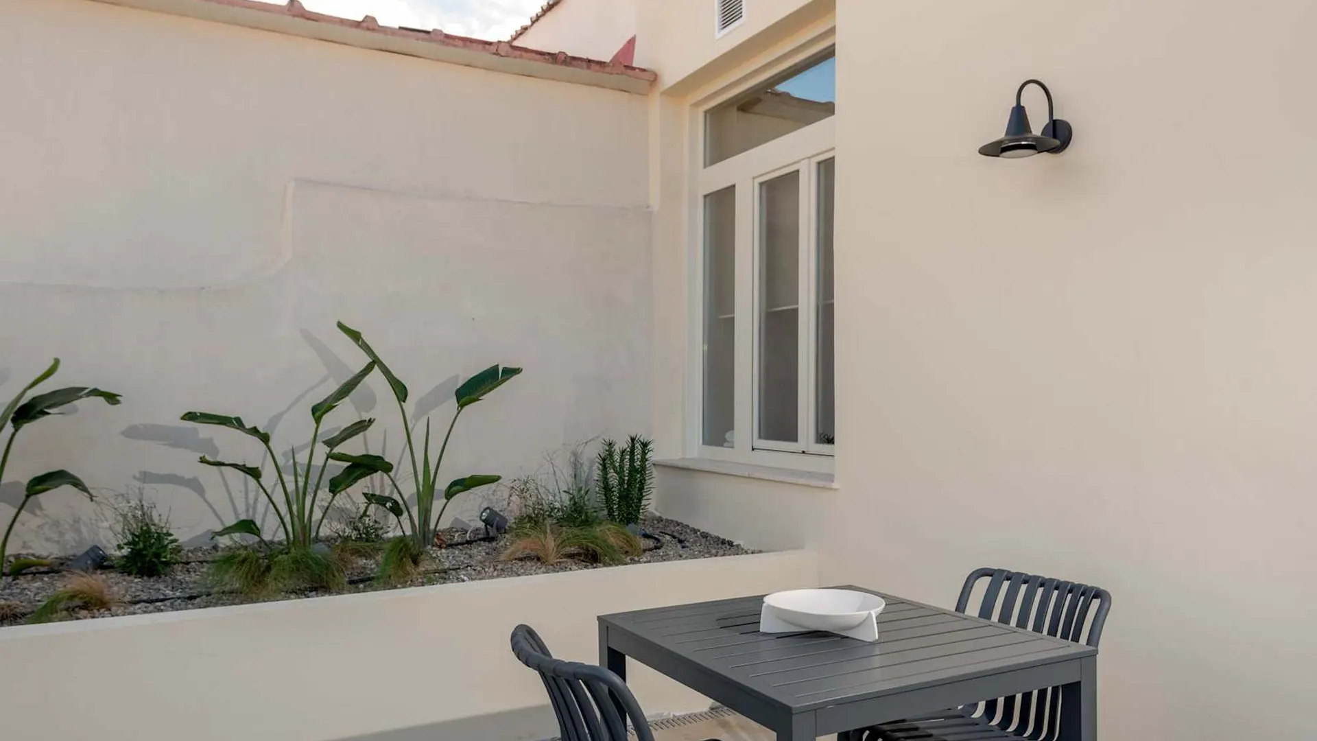 Planted private terrace with dining table for two, Amara Luxury Suite with Terrace